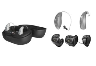Open charging case with two wireless earbuds inside; several hearing-aid components and domes laid out nearby (ear molds, BTE parts).