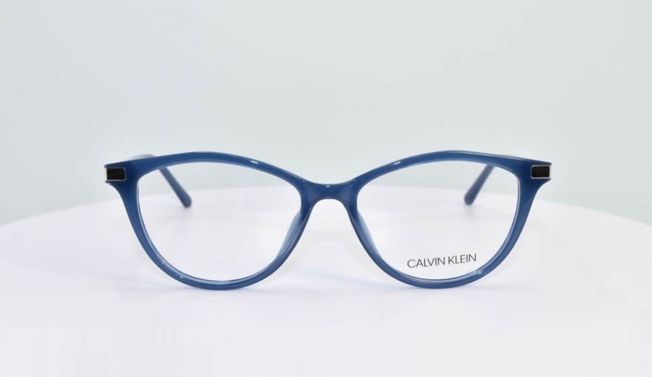 blue framed calvin klein glasses