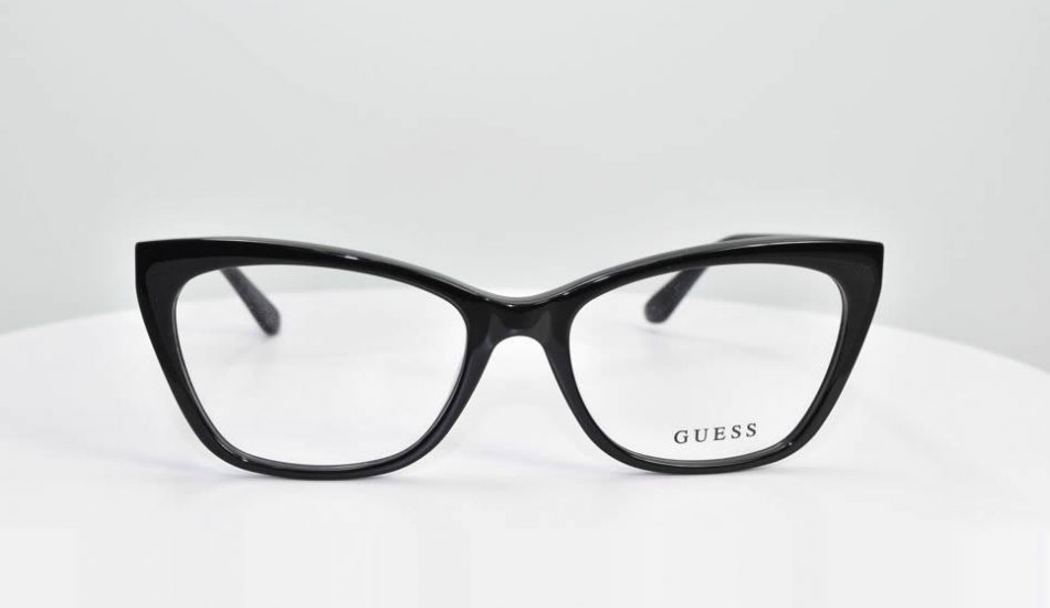 black framed guess glasses