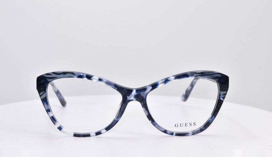 blue and black framed guess glasses