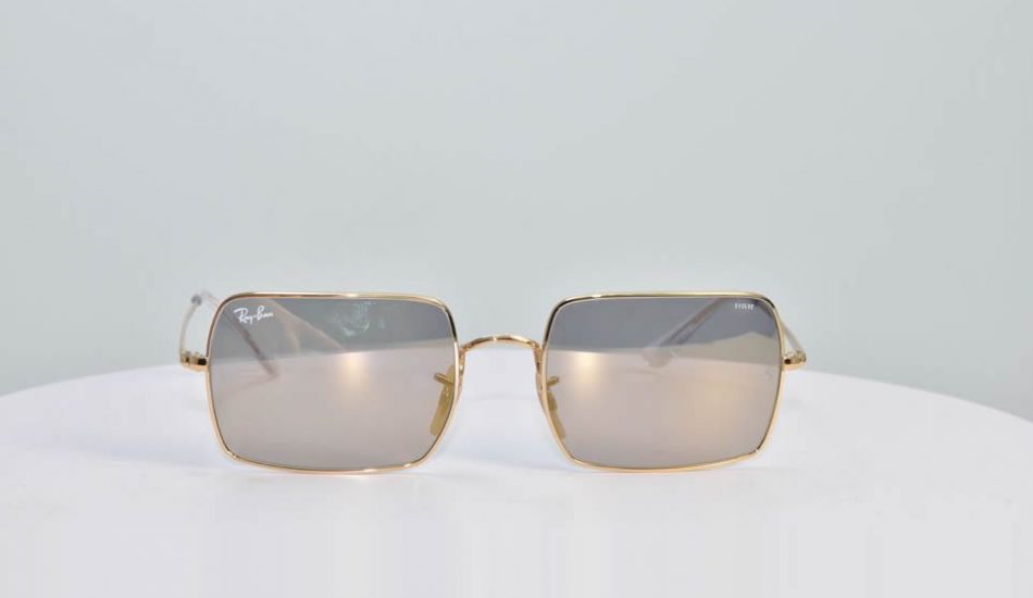 thin gold framed Ray Ban glasses