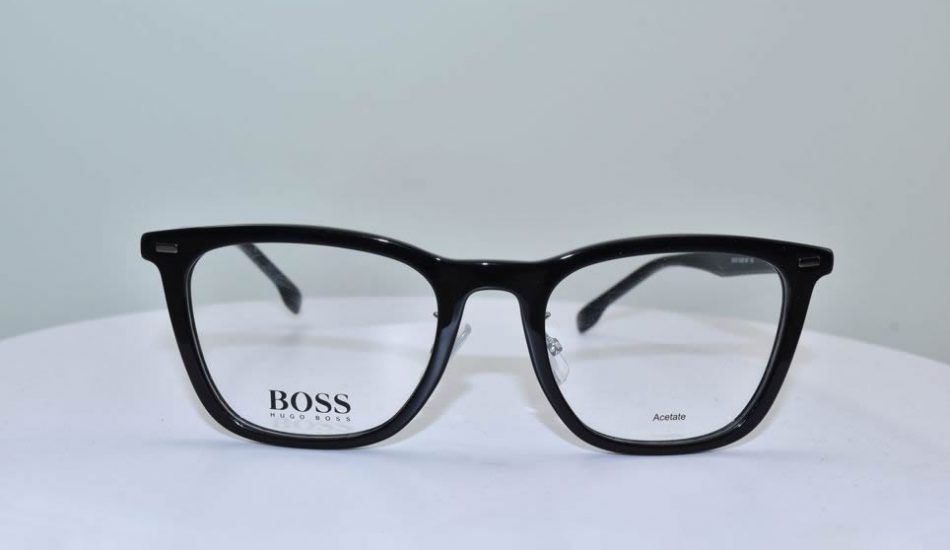 front angle of thick black framed Hugo Boss glasses