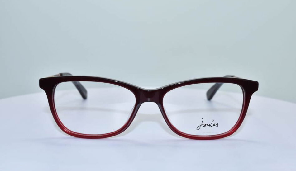 front angle of black and red framed Joules glasses