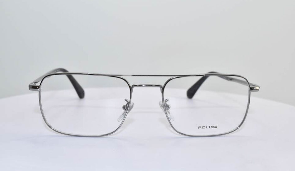 thin silver framed POLICE glasses