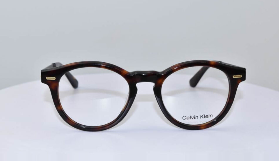 black and brown framed calvin klein glasses