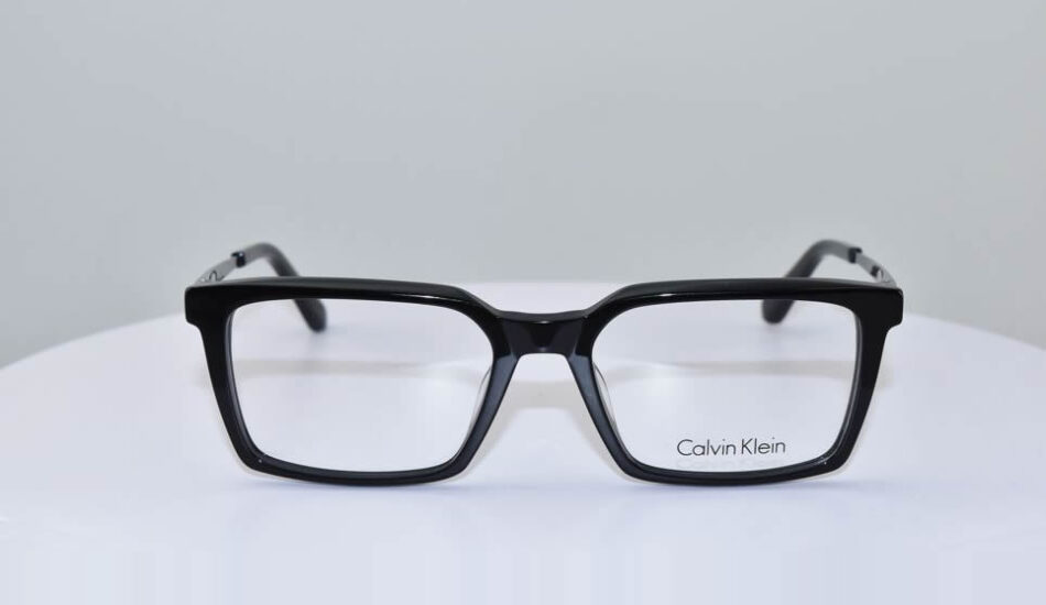 thick black framed calvin klein glasses