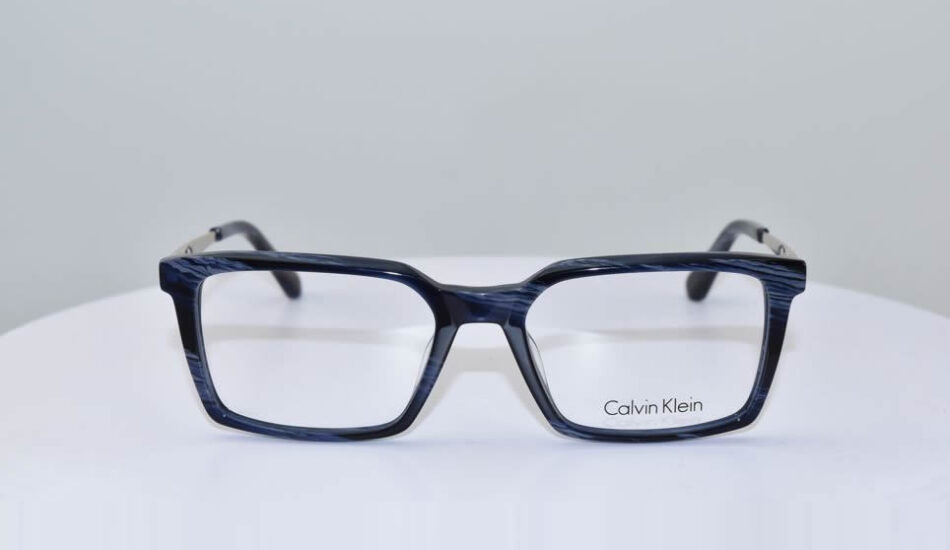 calvin klein blue and gold framed glasses