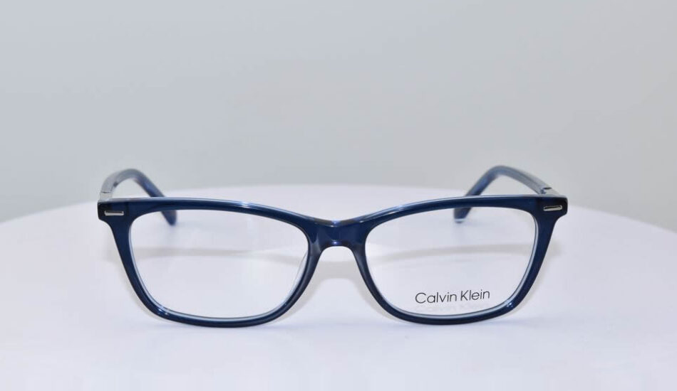blue framed calvin klein glasses