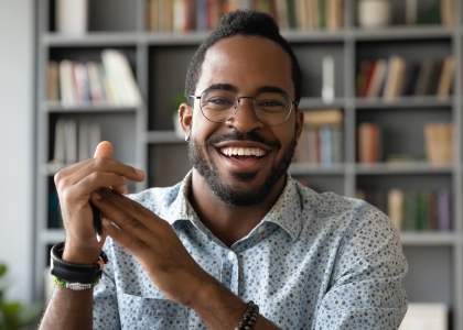 Smiling man in glasses
