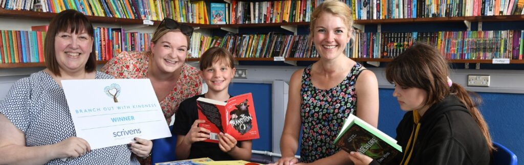 Community kindness initiative helps local school transform its library