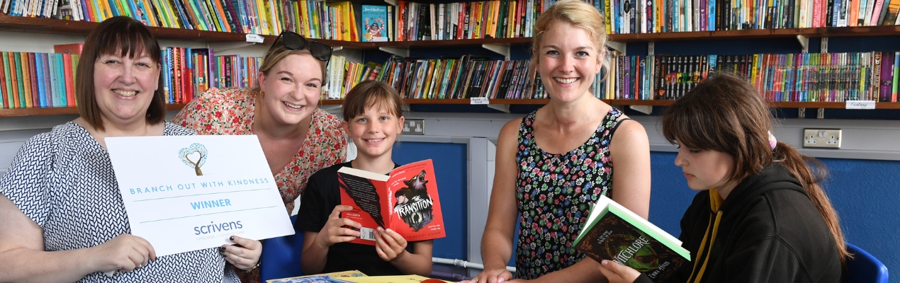 Community kindness initiative helps local school transform its library image