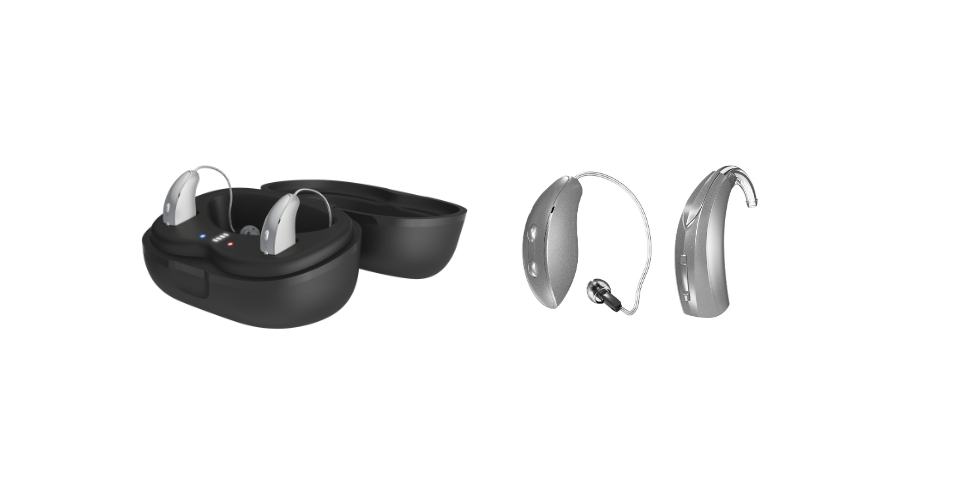 Pair of modern behind-the-ear (BTE) hearing aids with a charging case and charging cradle
