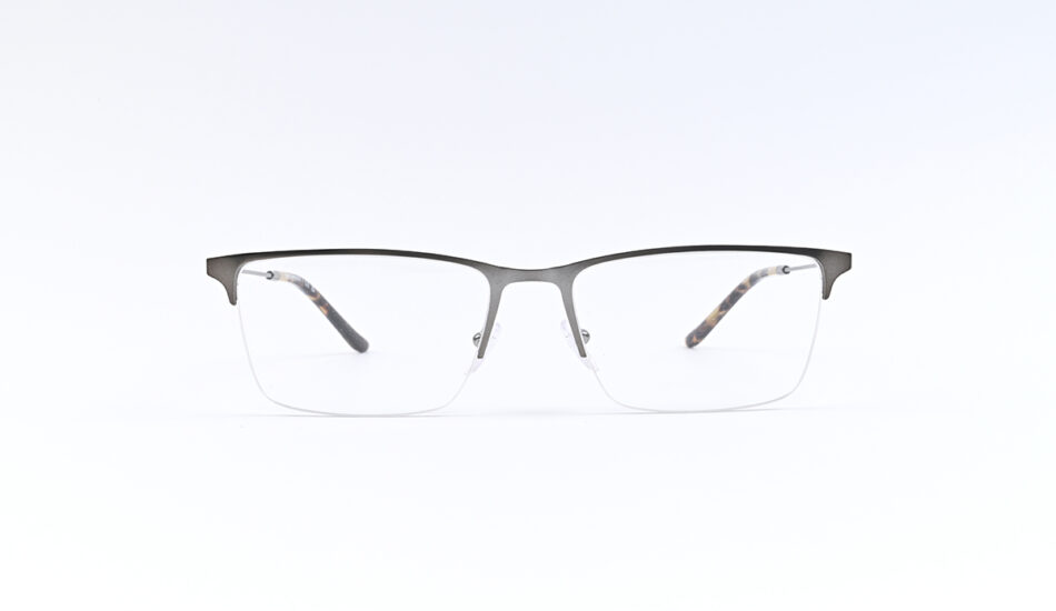 Semi-rimless eyeglasses with a dark top frame and tortoiseshell temples on a white background
