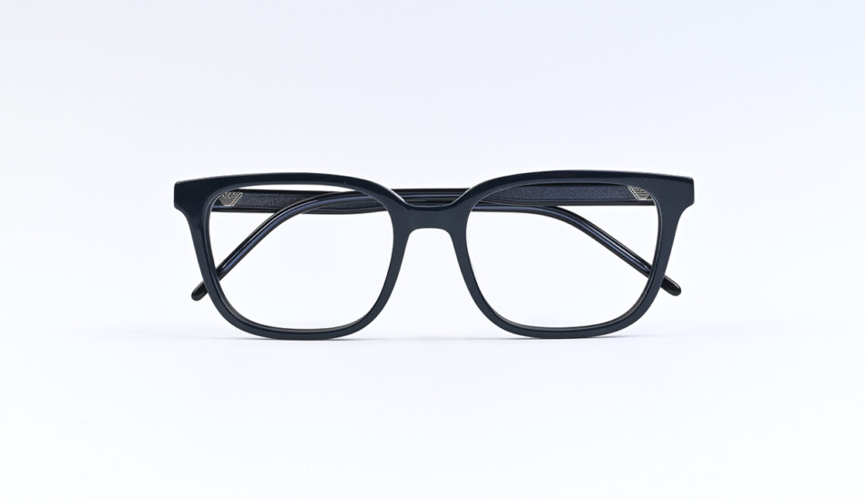 Black rectangular eyeglasses photographed head-on on a white background.