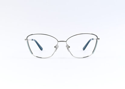 Metal cat-eye eyeglasses with blue temple tips on a white background.