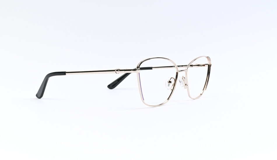 Gold metal-framed eyeglasses with clear lenses and adjustable nose pads on a white background