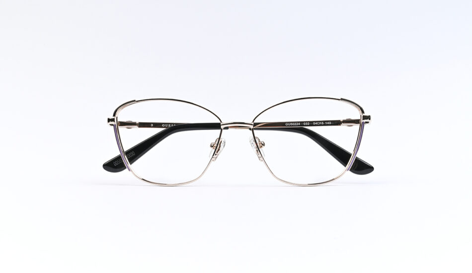 Metal rimmed oval eyeglasses with adjustable nose pads and black temple tips, centered on a white background.