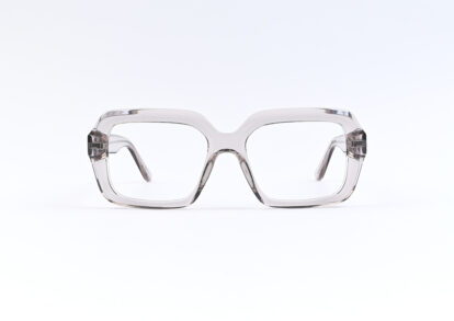 Clear oversized square eyeglasses with a double-bridge design on a white background from a front view.