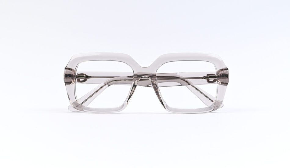 Clear oversized plastic glasses with square frames on a white backdrop, front view